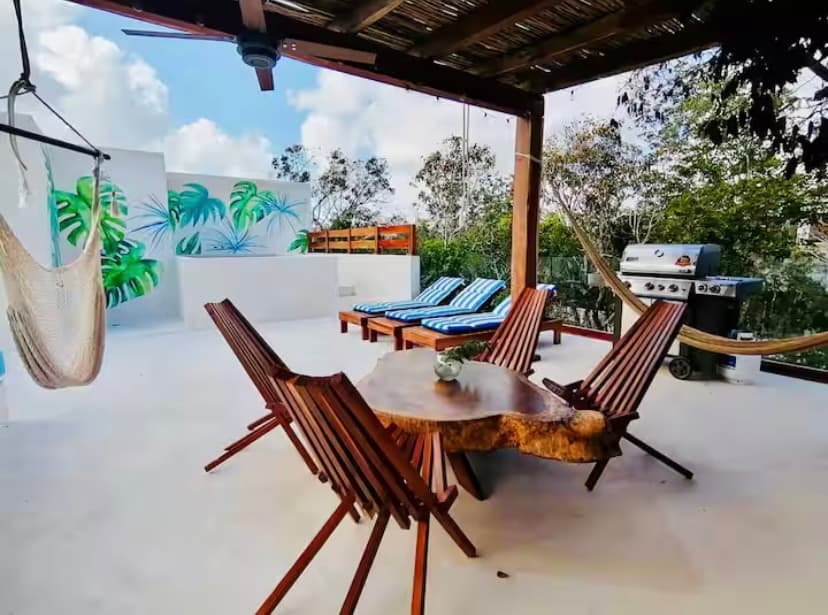 Rooftop terrace with live-edge dining table