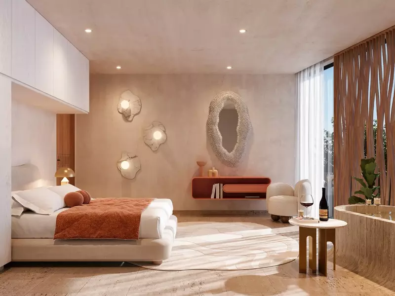 Bedroom suite with in-room soaking tub at The Curve Tulum